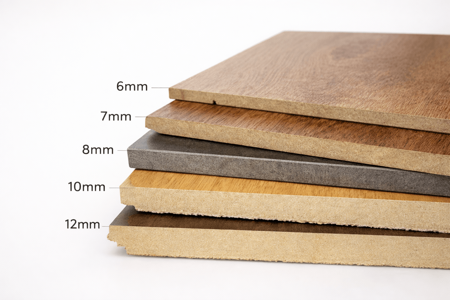 Comparison of laminate flooring plank thickness showing 8mm 10mm and 12mm laminate flooring for durability and installation performance.